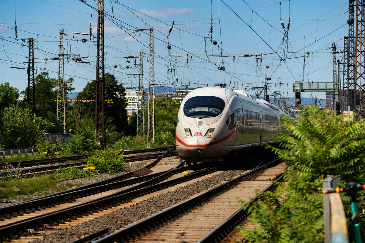 An ICE train on railway tracks.